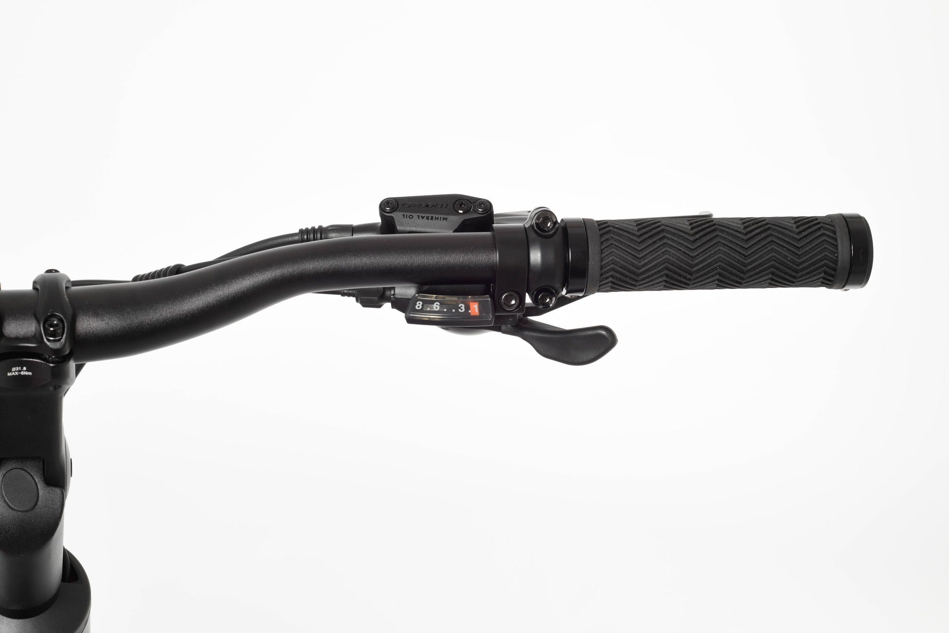 Close-up of a black electric bike handlebar with throttle and brake lever on a white background