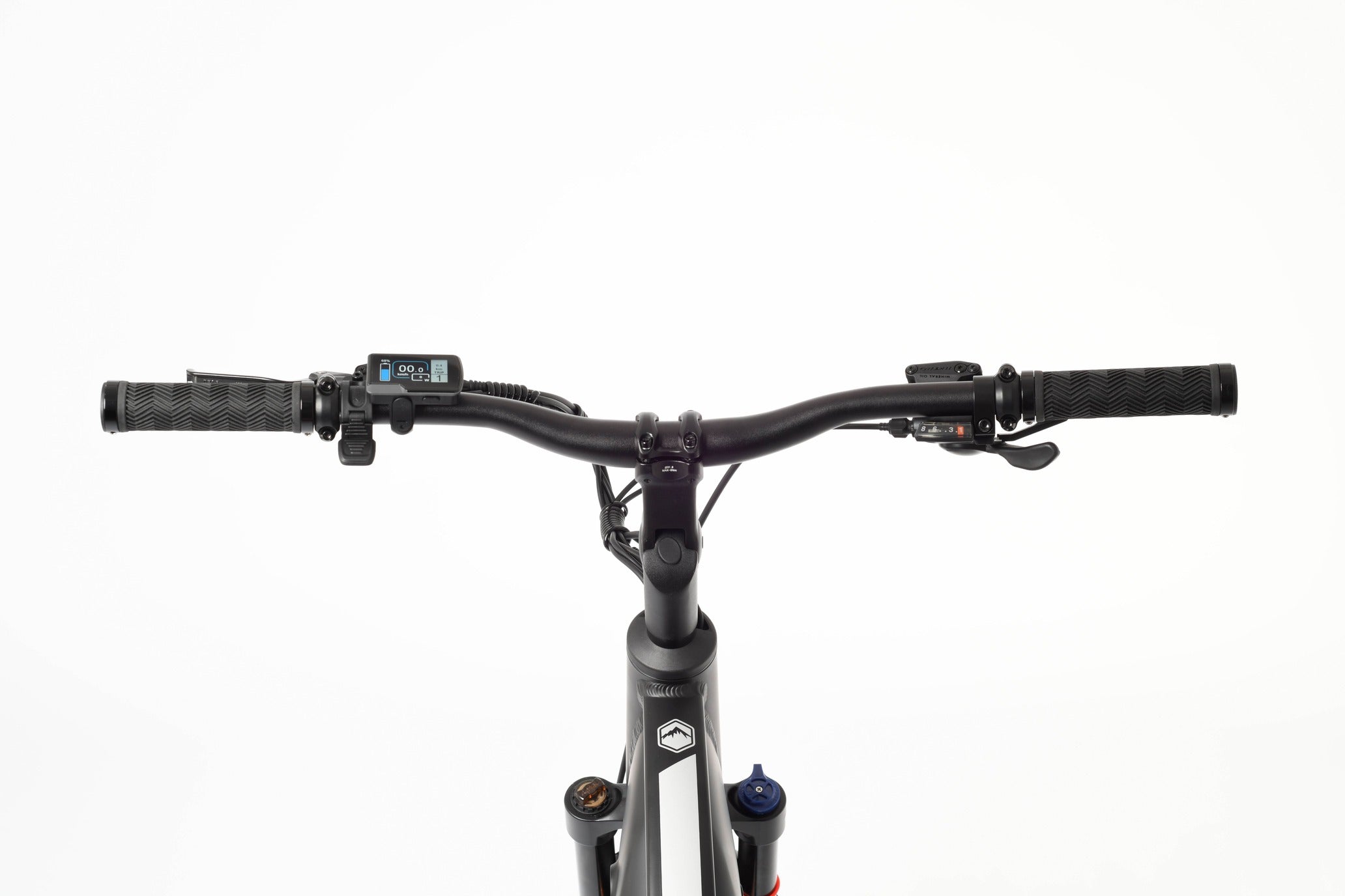 Close-up of a bicycle handlebar with control buttons on a white background