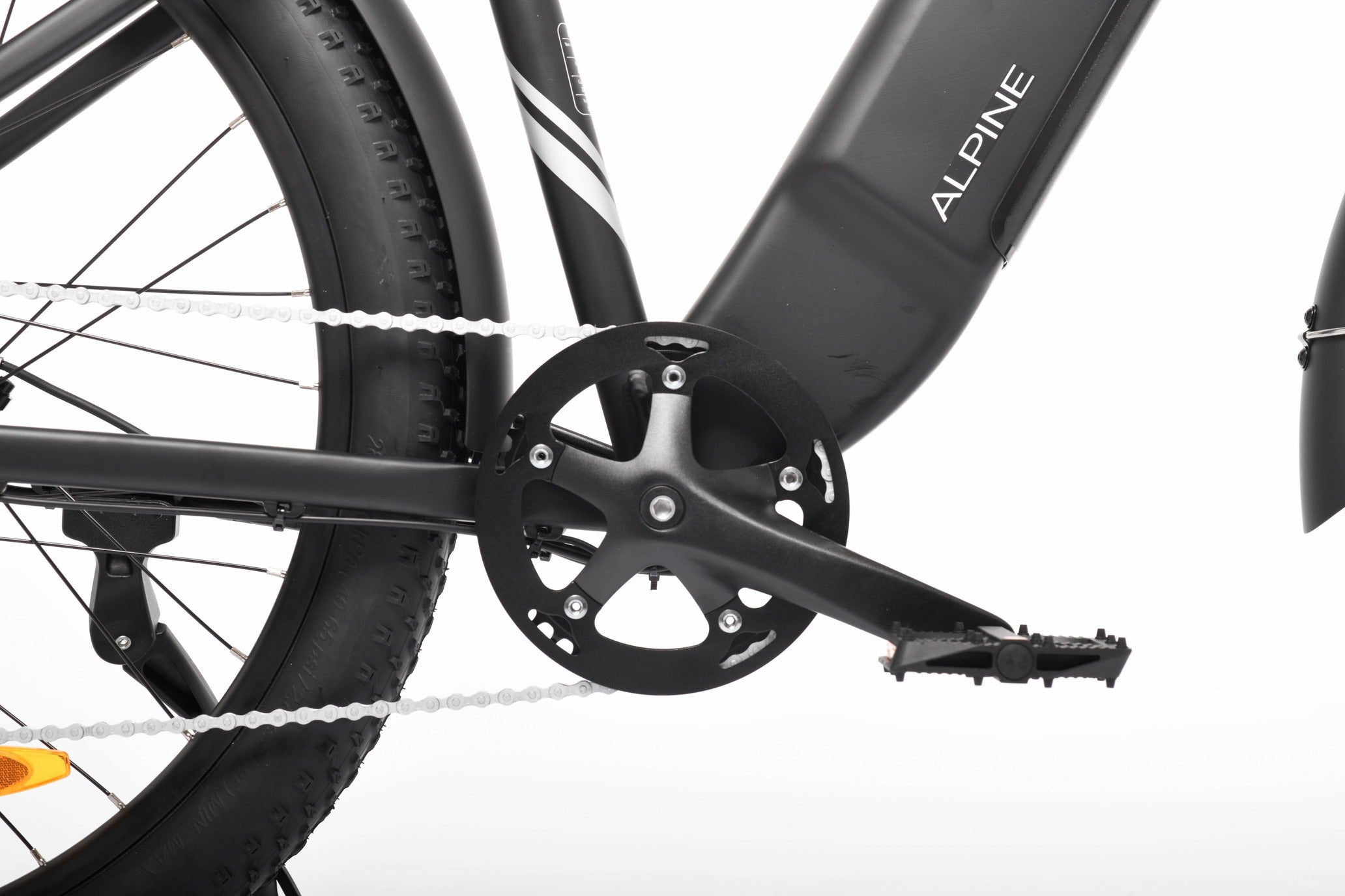 Close-up of a bicycle chain and gear system with 'Alpine' branding on a white background