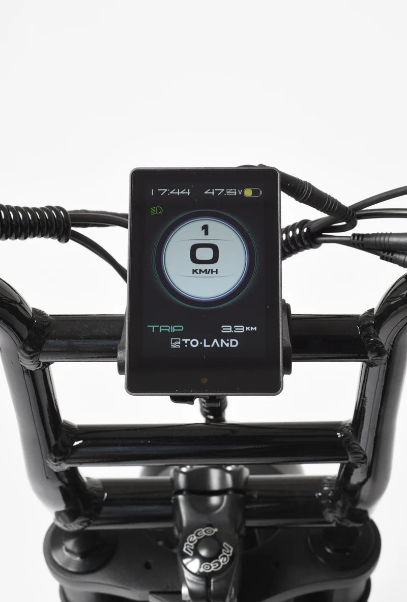 Digital display on an electric bike handlebar with various readings.