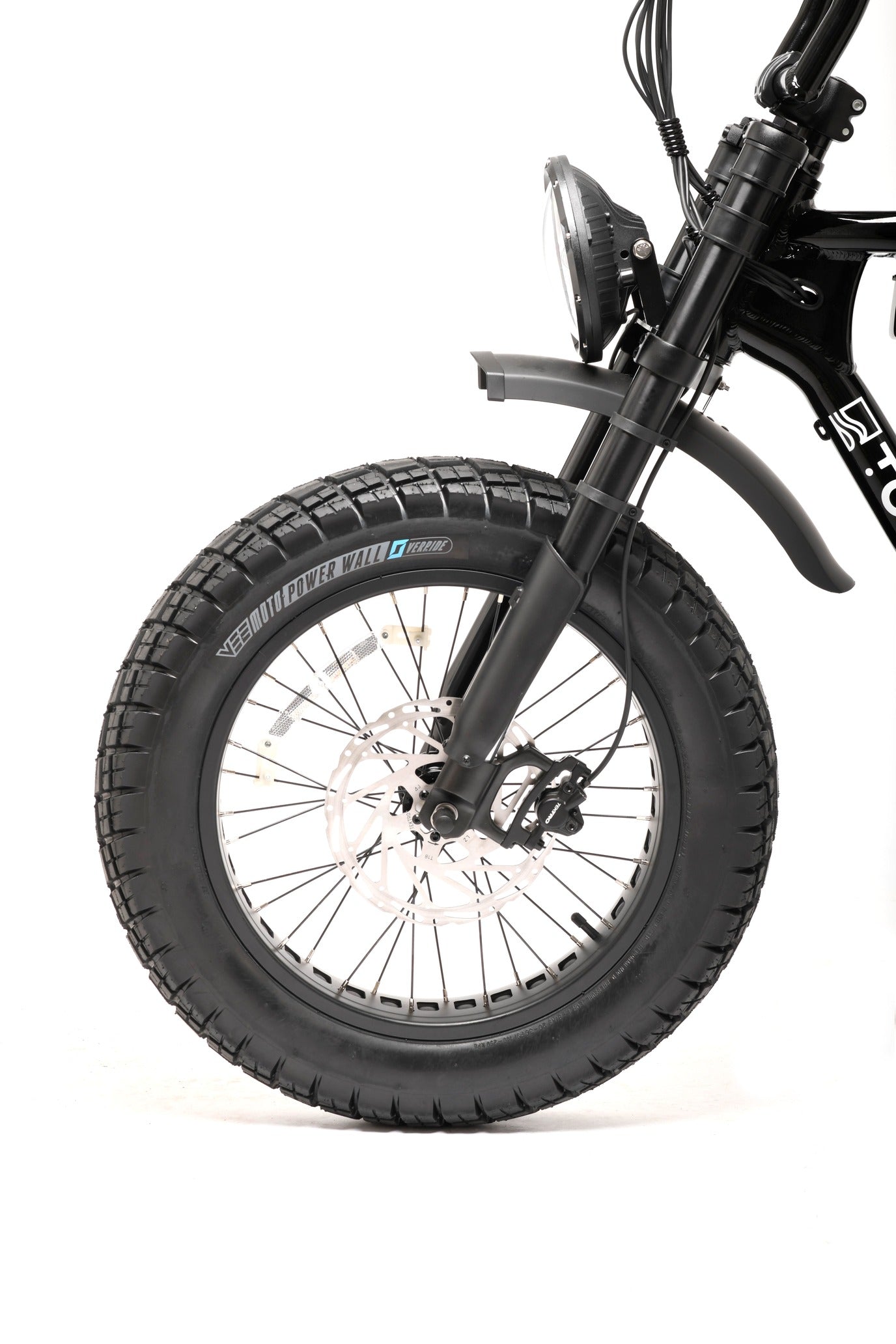 Close-up of a bicycle wheel with black fat tyre and visible spokes on a white background