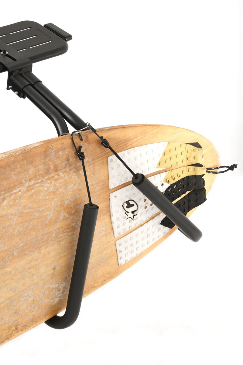Surfboard with a black stand and leash on a white background
