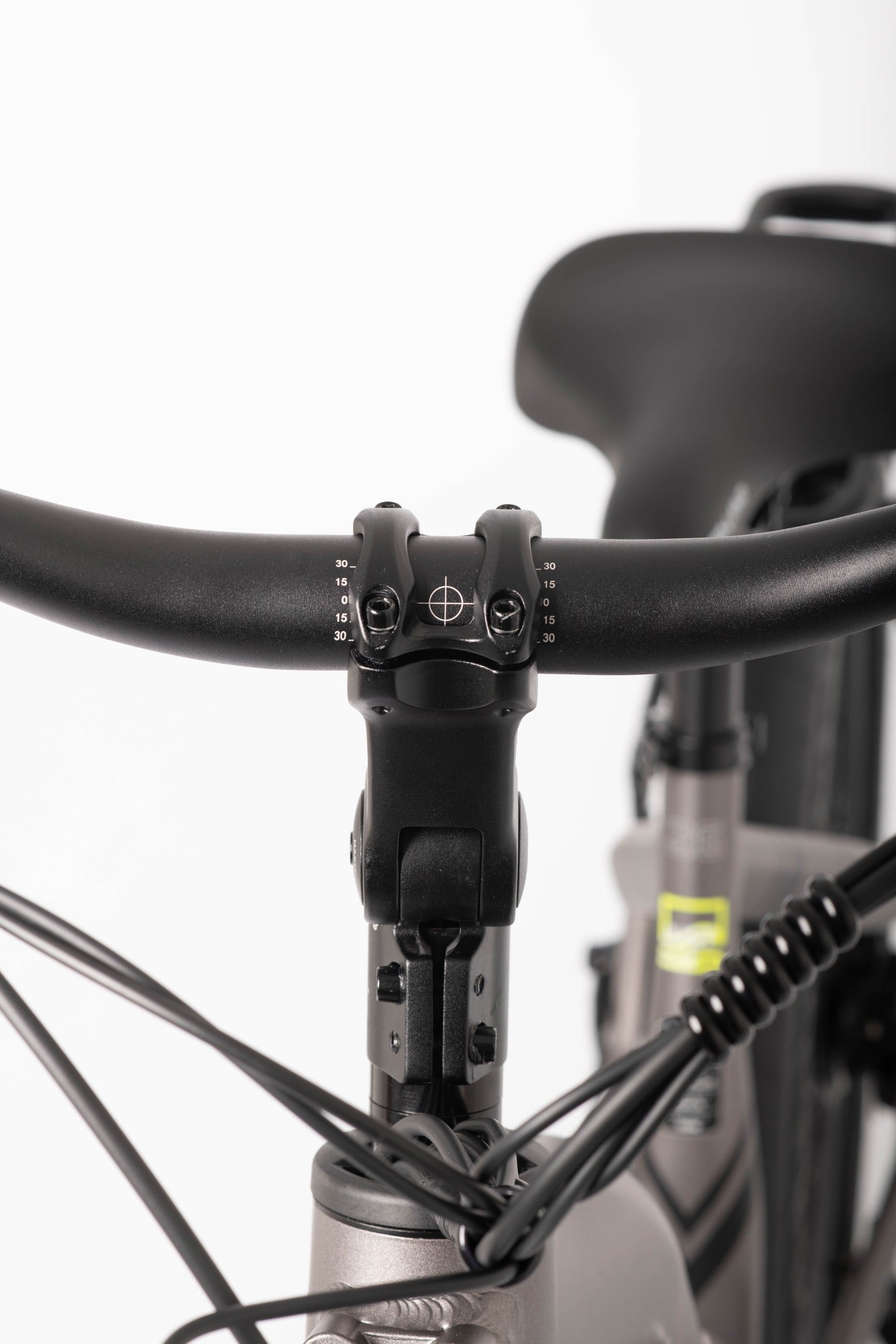 Close-up of a bicycle handlebar with a white background