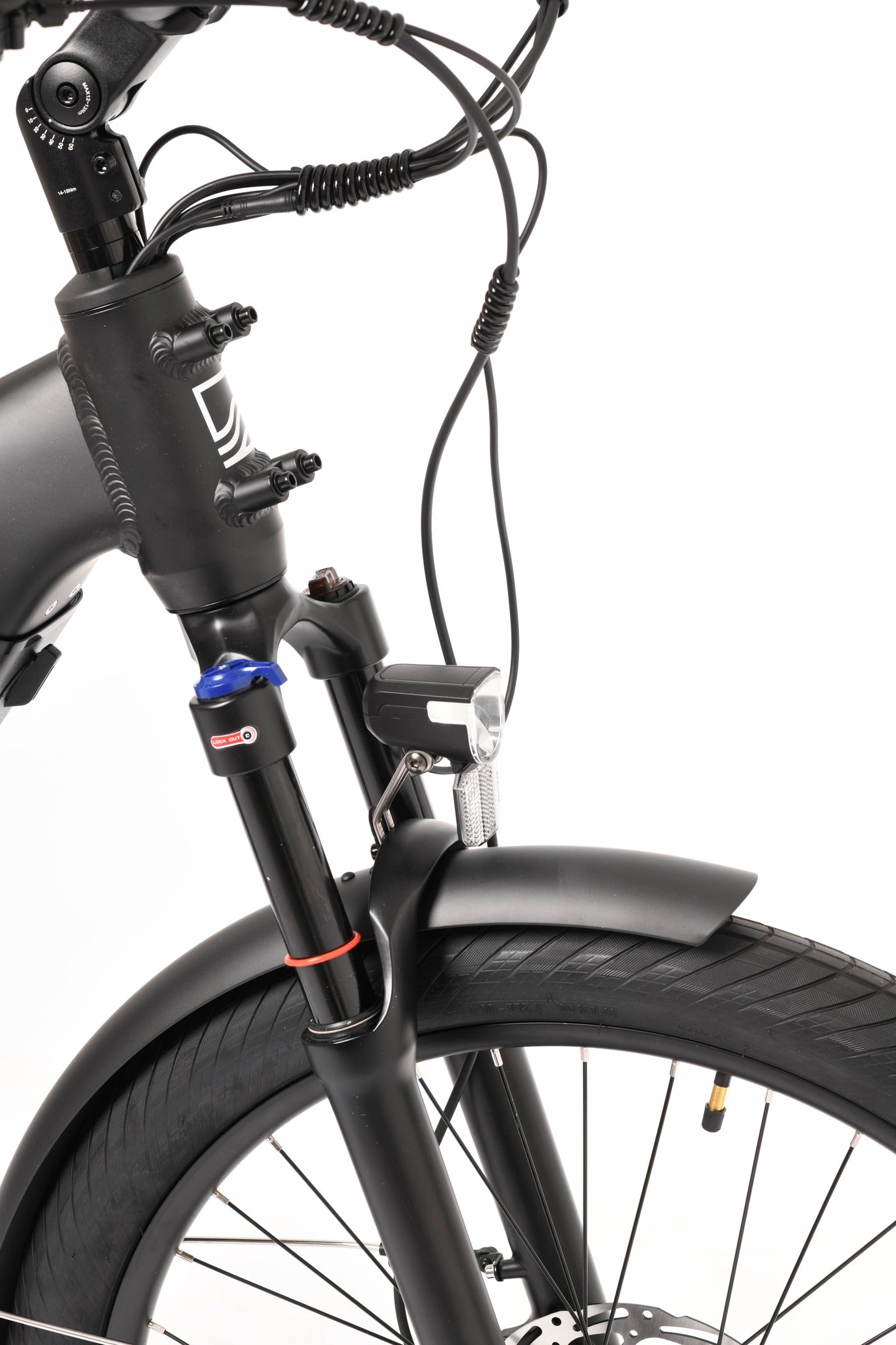 Close-up of a bicycle's suspension fork and front wheel on a white background
