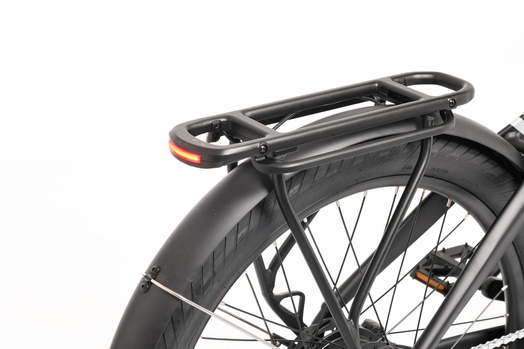 Bicycle rear wheel with a black rack on a white background