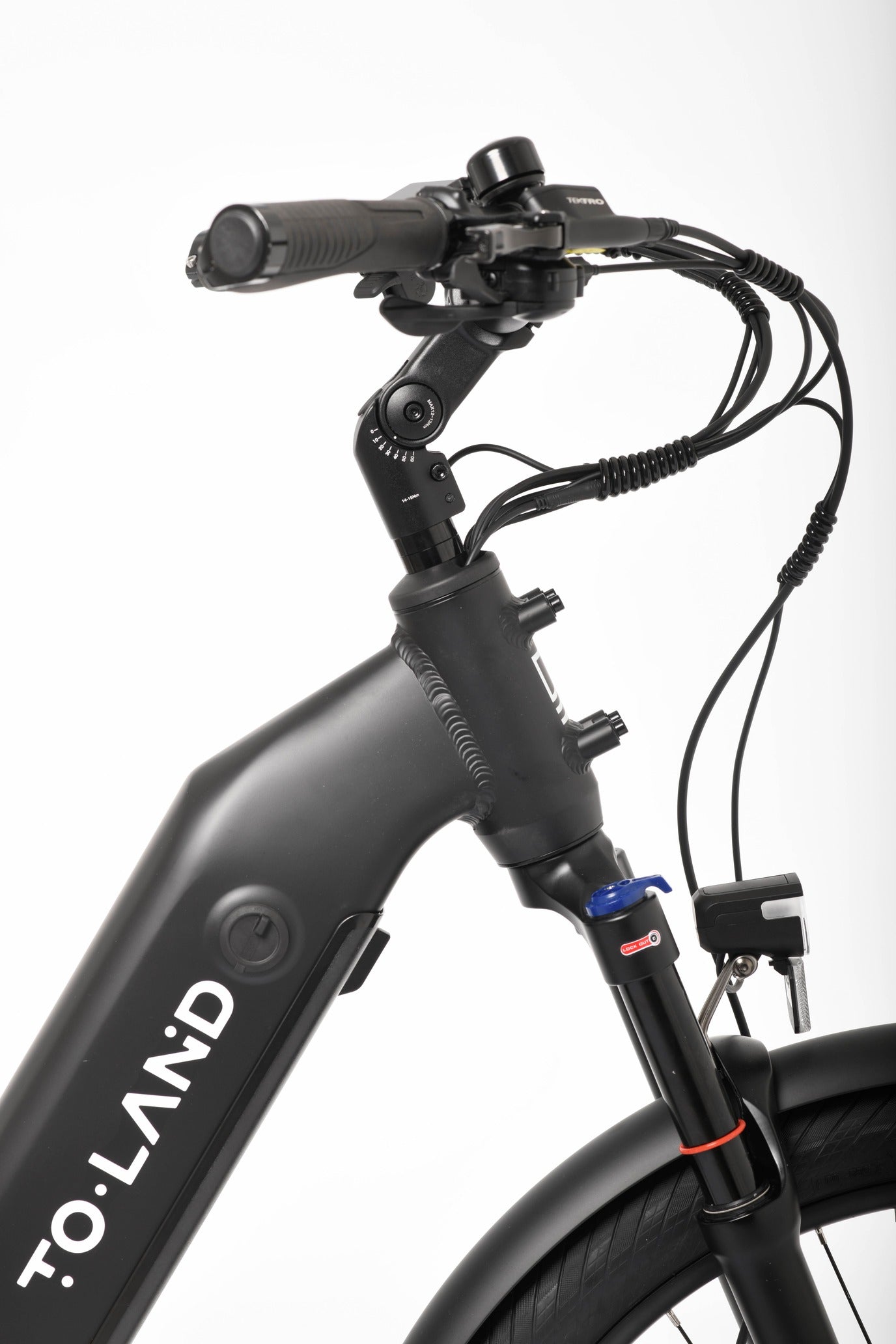 Close-up of a black electric bike with 'Toland' branding on a white background