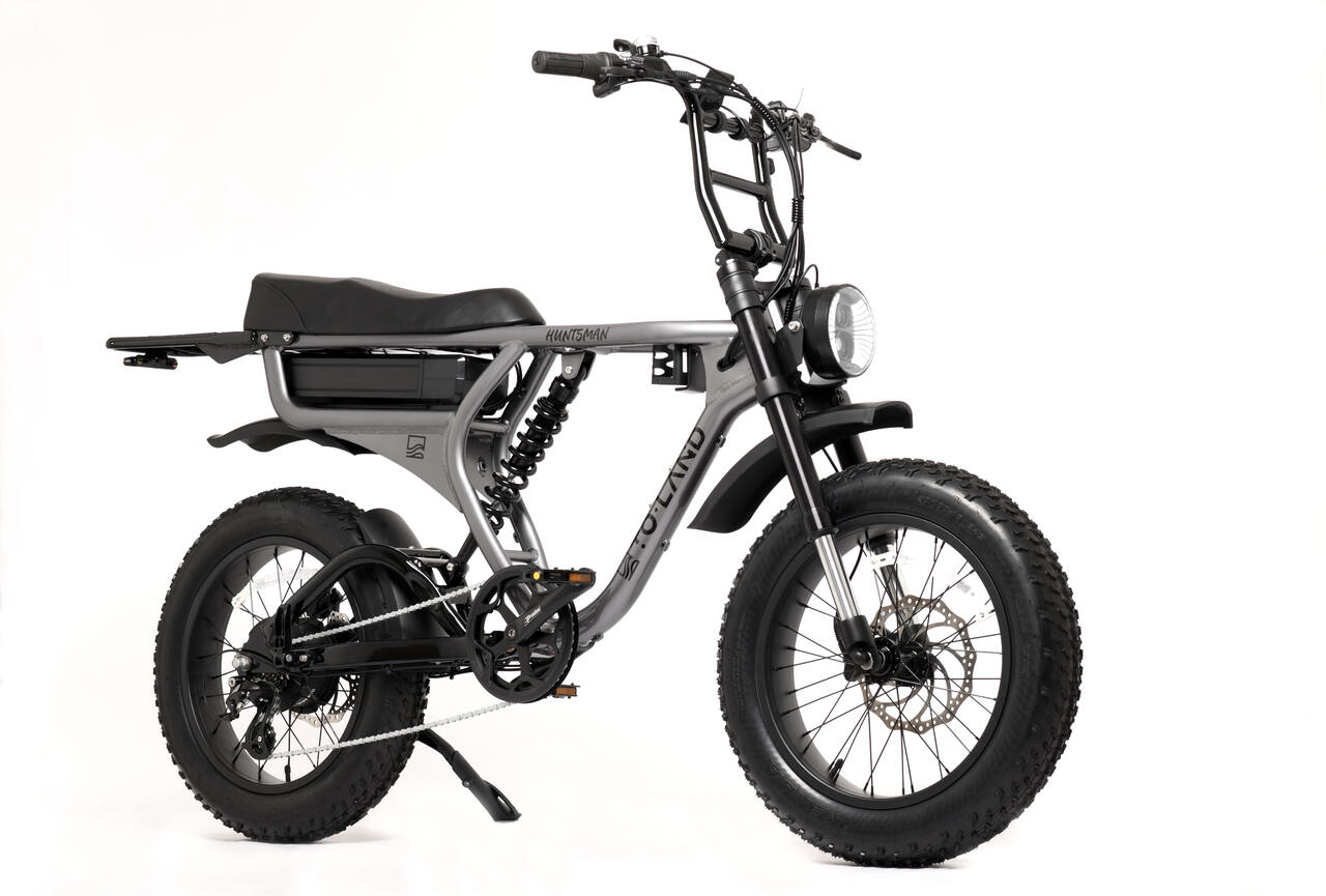 Grey electric bike with black seat on a white background