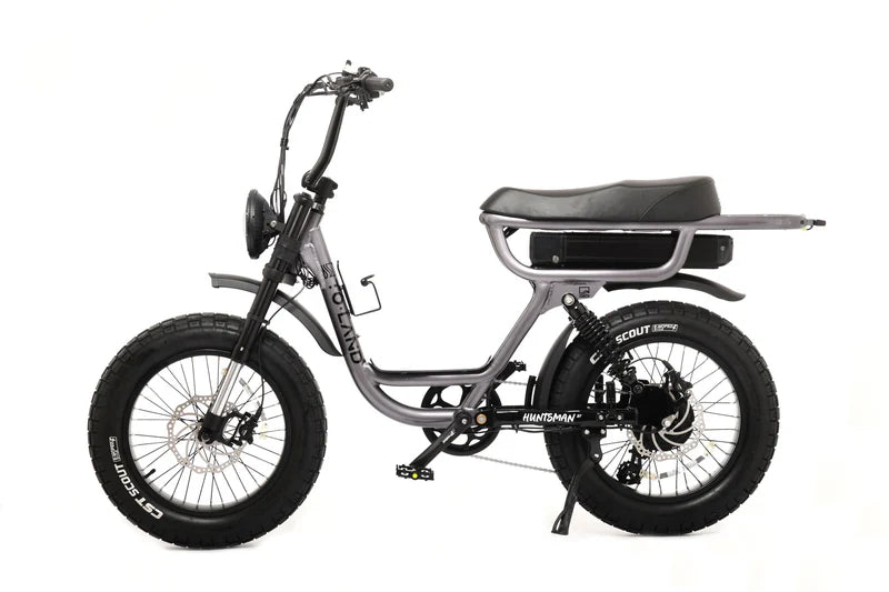 Gun metal electric bike with a black seat on a white background