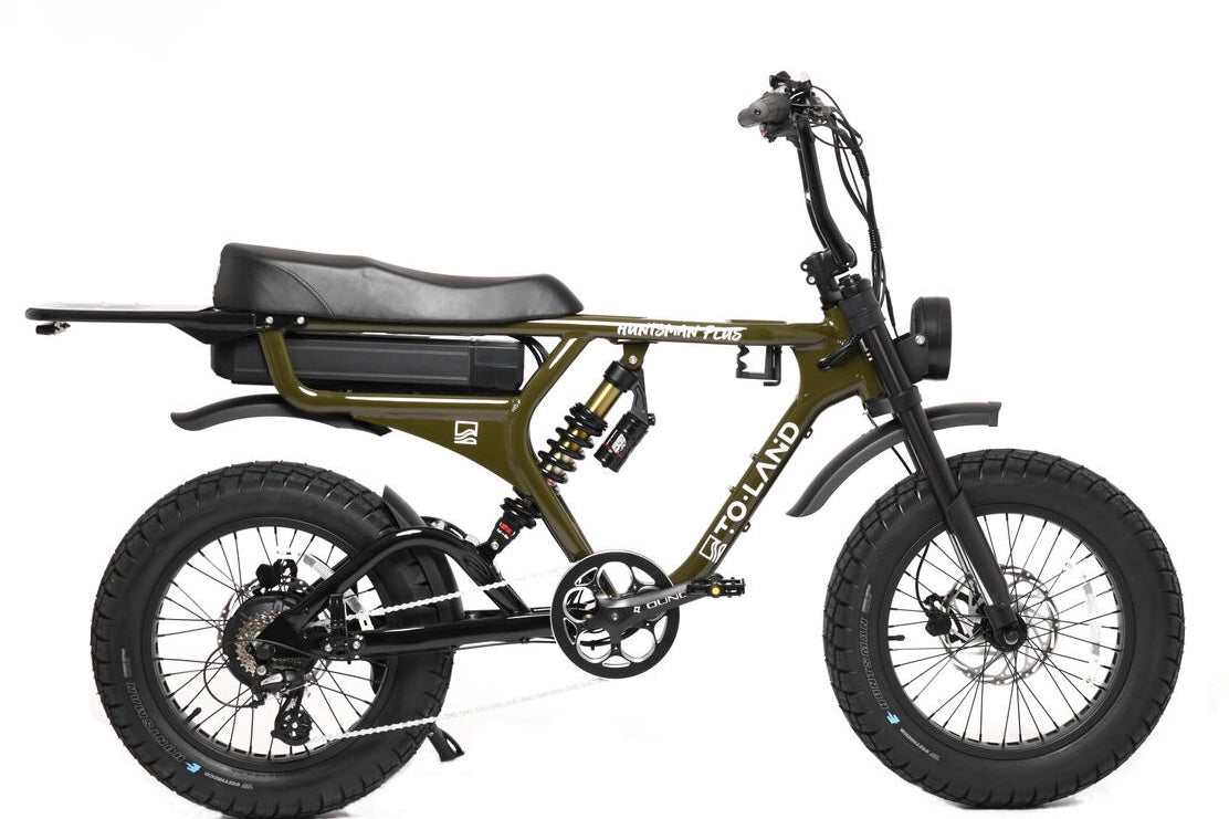 An electric bike. The bike is primarily black and white, with off-road tires and a visible battery pack.