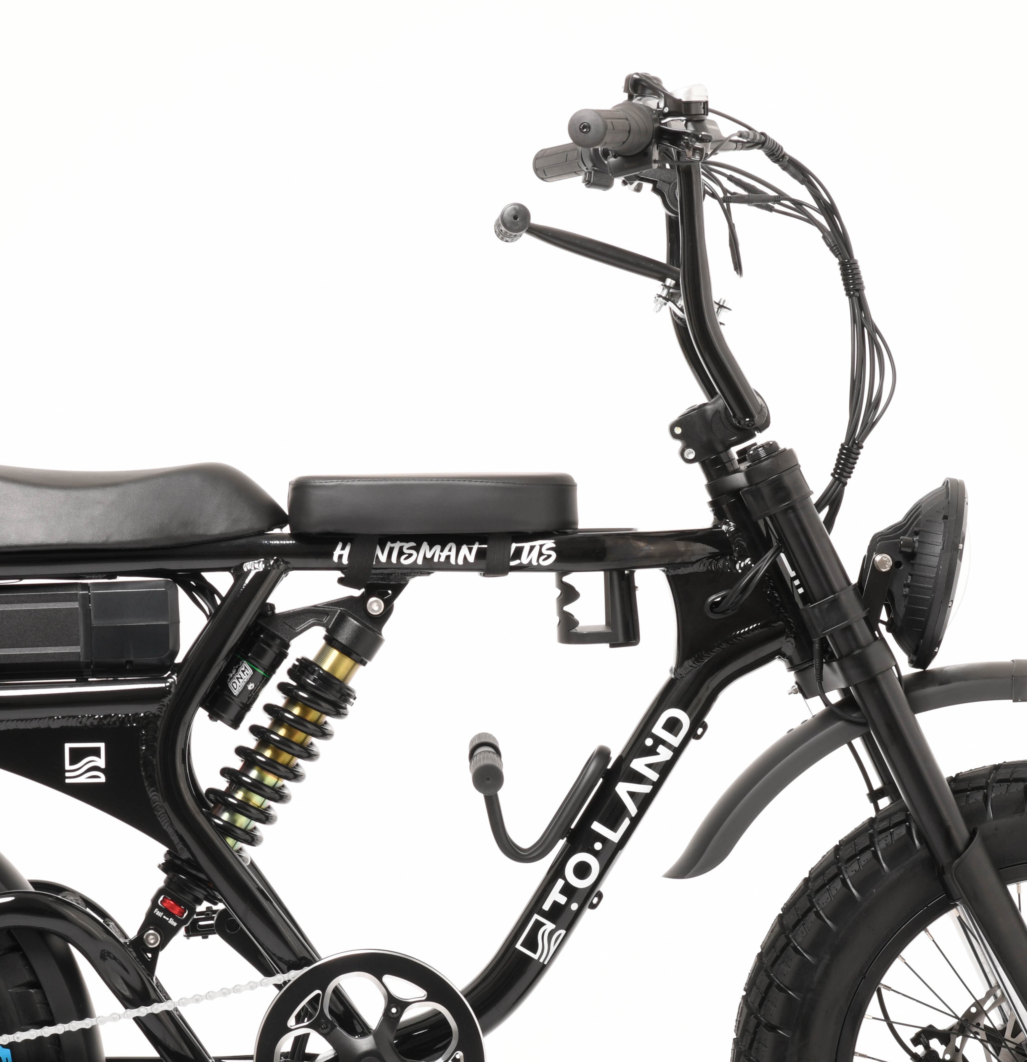 Black electric bike with foot pegs on a white background